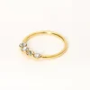 Anneau pour piercing de nez à quatre strass 0,6 mm couleur argentée et couleur dorée