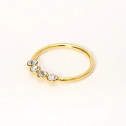 Anneau pour piercing de nez à quatre strass 0,6 mm couleur argentée et couleur dorée