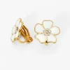 Boucles d'oreilles à clip fleurs blanches décorées