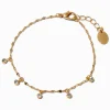 Bracelet avec breloques confetti délicates en zircon cubique couleur dorée