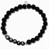 Bracelet élastique perlé « Brave » noir