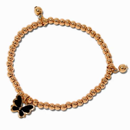 Bracelet élastique perlé couleur dorée et papillon émaillé noir