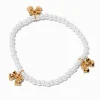 Bracelet élastique perlé perles d'imitation et nœud couleur dorée