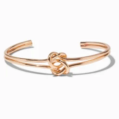 Bracelet manchette double nœud couleur dorée