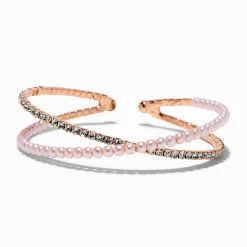 Bracelet manchette motif entrecroisé perle d'imitation rose tendre et strass couleur doré rose