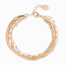 Bracelet multi-rangs chaînes de styles variés couleur dorée