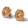 Clous d’oreilles à clip tourbillons couleur dorée