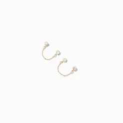 Clous d'oreilles reliés par une chaîne en zircon cubique d'imitation couleur dorée