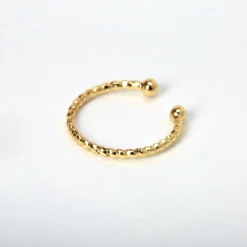 Faux anneau de nez motif tressé couleur dorée