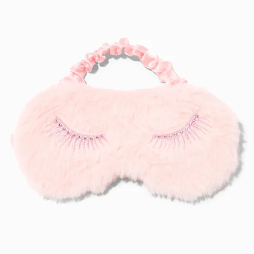 Masque de sommeil rose tendre cils métallisés