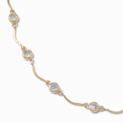 Ras-de-cou festonné délicat avec zircon cubique couleur dorée