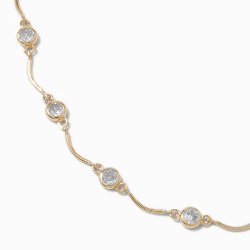 Ras-de-cou festonné délicat avec zircon cubique couleur dorée