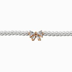 Ras-de-cou perle d'imitation nœud en zircon cubique couleur dorée