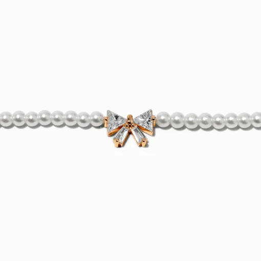 Ras-de-cou perle d'imitation nœud en zircon cubique couleur dorée